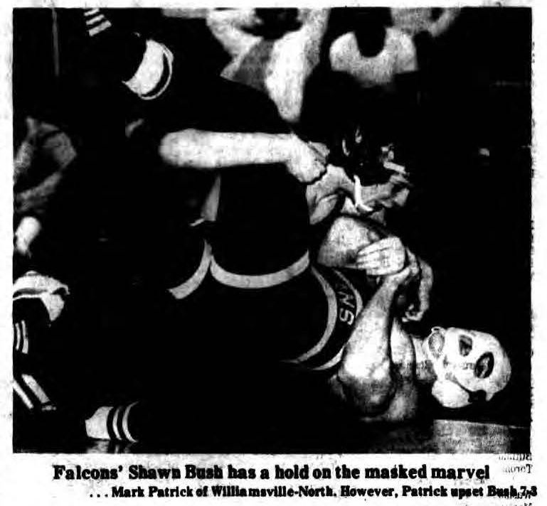 Falcons\' Shawn Bush has a hold on the masked marvel