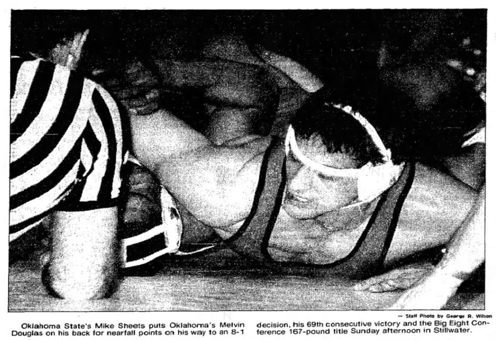 Mike Sheets puts Melvin Douglas on his back