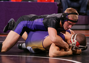 Joey Ranzenbach of NYU controls Hunter\'s Matt Myers in the 133 pound match. Ranzenbach won by major decision 8-0.