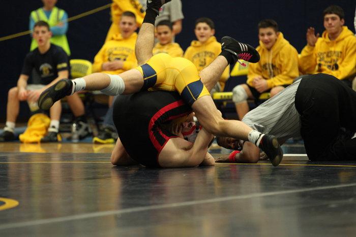 Team Captain Steve Maier stacks his opponent for the pin vs Hilton
